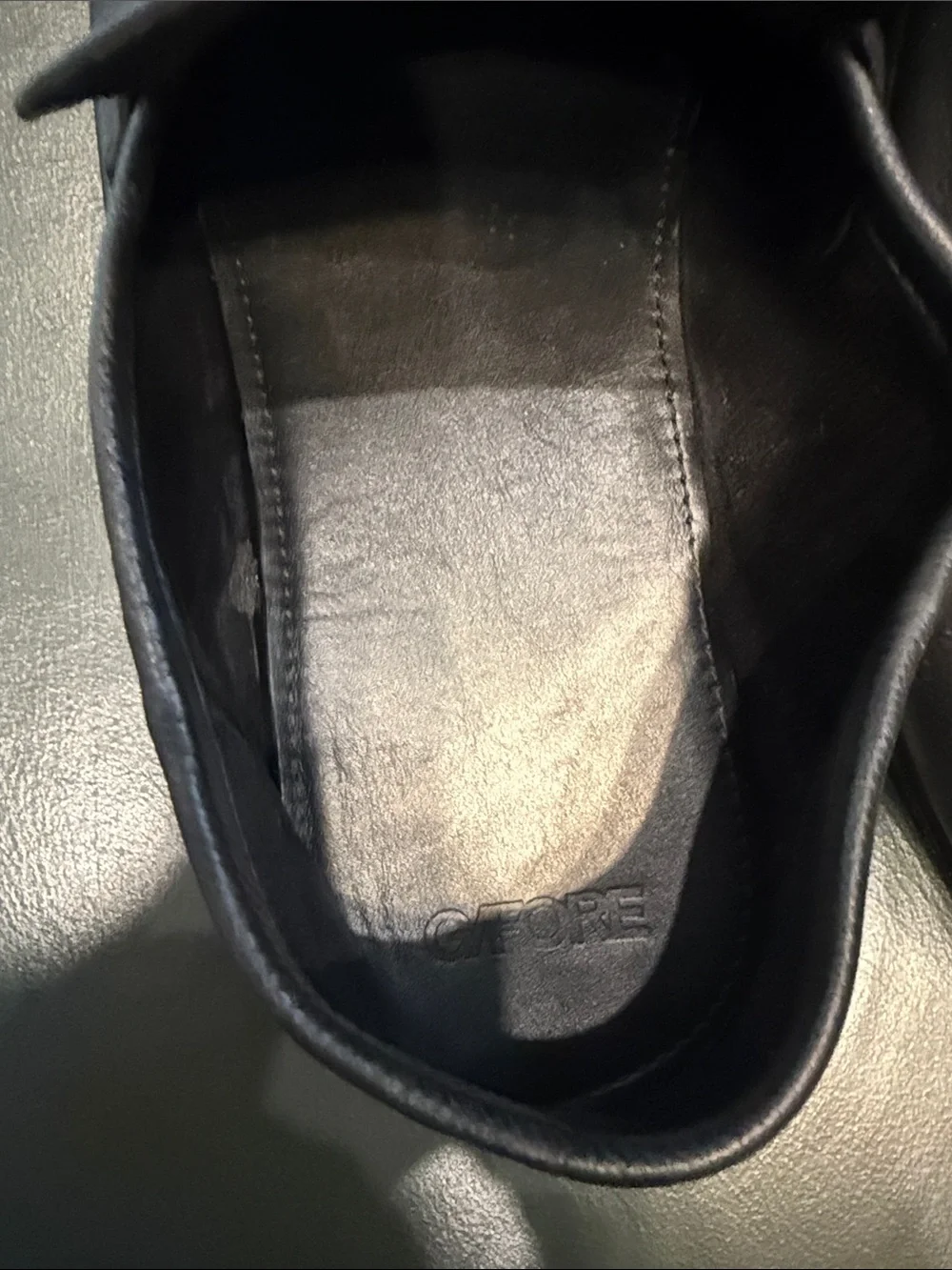G/FORE Black Leather Slip-On Loafers with Gold Cross Accent